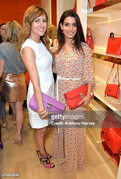 Tonia Sotiropoulou and Aphrodite Pigi attend the launch of the New Folli Follie Flagship Store on Oxford Street on May 28, 2015 in London, England.