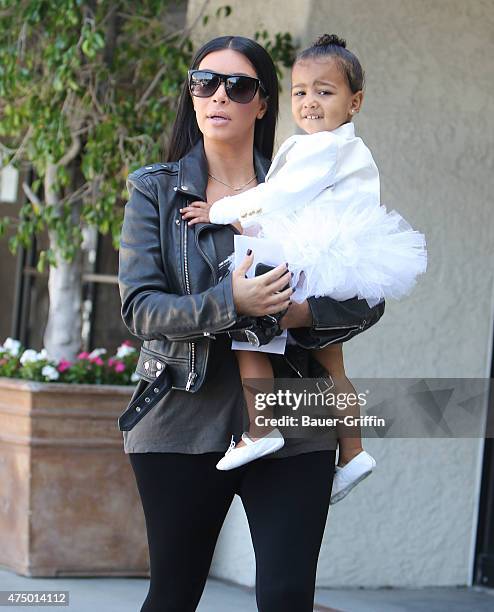 Kim Kardashian and North West are seen in Los Angeles on May 28, 2015 in Los Angeles, California.