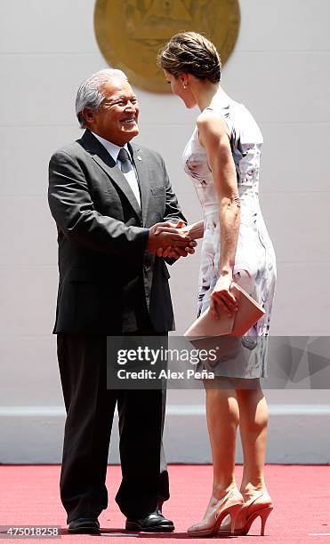 Queen Letizia of Spain and Salvador Sanchez Ceren President of El Salvador greet during an official welcome ceremony at Presidential Palace during...