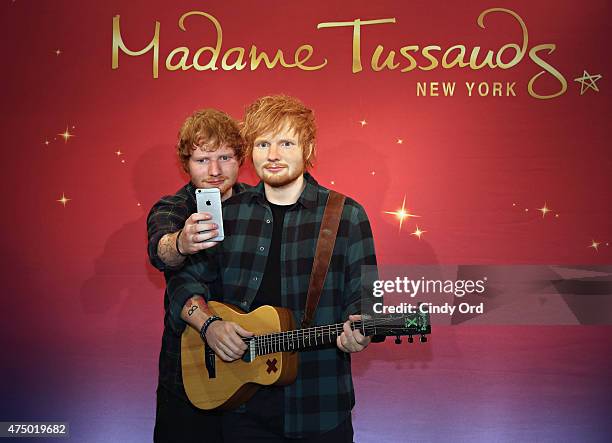 Singer Ed Sheeran unveils his never-before-seen Madame Tussauds wax figure at Madame Tussauds New York on May 28, 2015 in New York City.