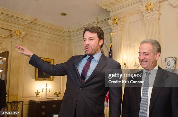 Ben Affleck and Sen. Former U.S. Sen. Russ Feingold speak during a photo op at The State Department on February 26, 2014 in Washington, DC. Affleck,...