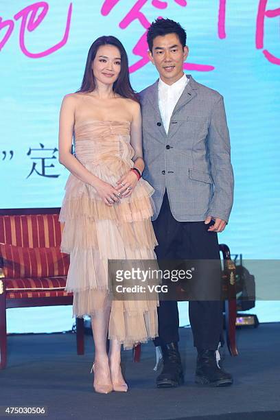 Actress Shu Qi and Taiwaness singer and actor Richie Jen attend new film "All You Need Is Love" press conference on May 28, 2015 in Beijing, China.