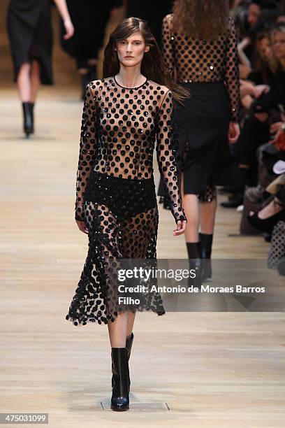 Model walks the runway during the Guy Laroche show as part of the Paris Fashion Week Womenswear Fall/Winter 2014-2015 on February 26, 2014 in Paris,...