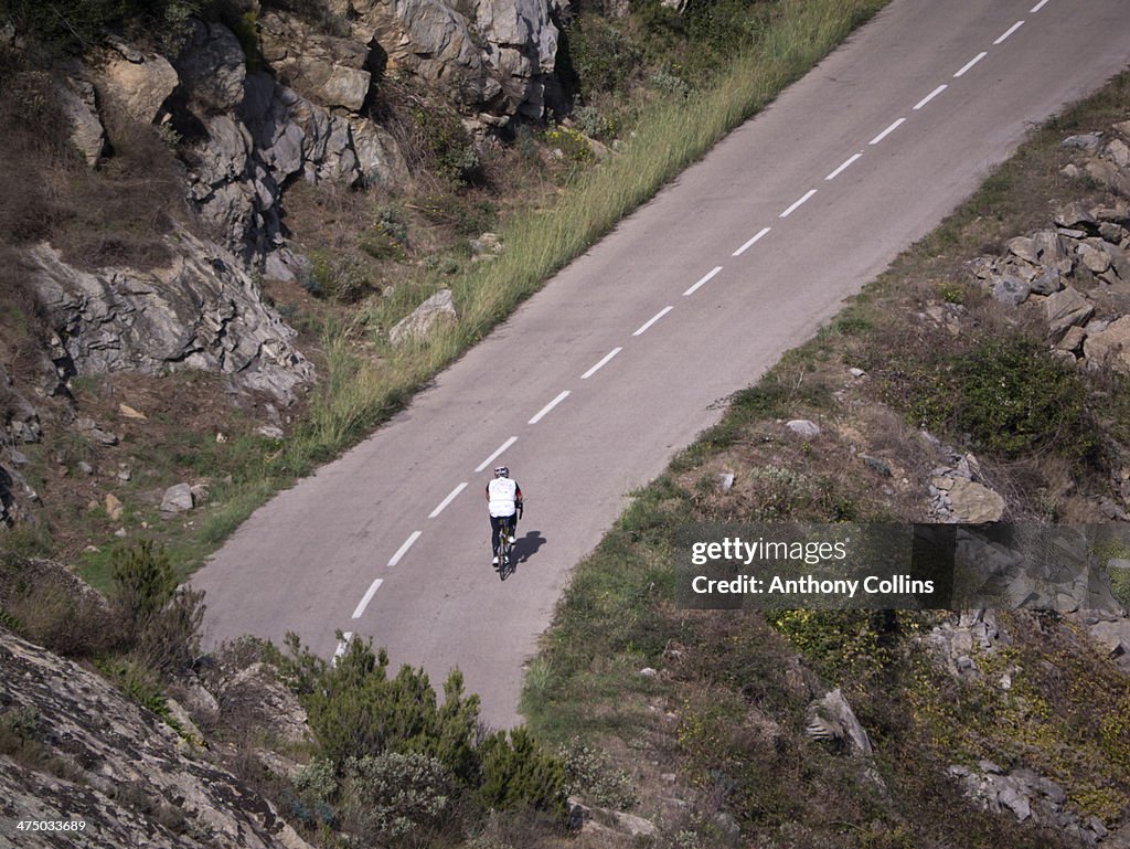 Cyclist riding in the Costa Brava Hills