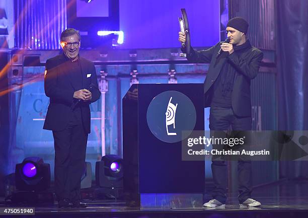 Jan Hofer and Andreas Schaerer attend the Echo Jazz 2015 at the dockyard of Blohm+Voss on May 28, 2015 in Hamburg, Germany.