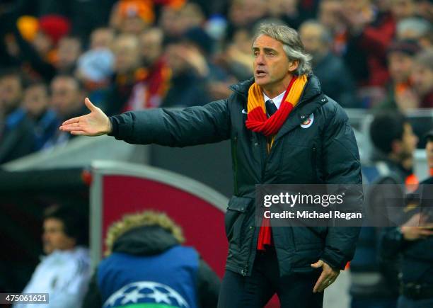 Head Coach Roberto Mancini of Galatasaray gives instructions during the UEFA Champions League Round of 16 first leg match between Galatasaray AS and...