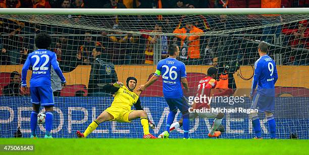 Aurelien Chedjou of Galatasaray scores their first goal past Petr Cech of Chelsea during the UEFA Champions League Round of 16 first leg match...