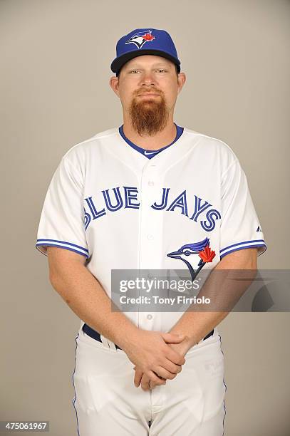 Adam Lind of the Toronto Blue Jays poses during Photo Day on Tuesday, February 25, 2014 at Florida Auto Exchange Stadium in Dunedin, Florida.