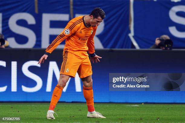 Cristiano Ronaldo of Madrid celebrates his team's sixth goal during the UEFA Champions League Round of 16 first leg match between FC Schalke 04 and...