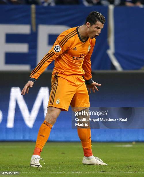 Cristiano Ronaldo of Real Madrid celebrates after scoring his team's sixth goal during the UEFA Champions League Round of 16 first leg match between...