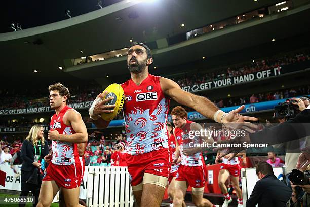 Adam Goodes of the Swans runs onto the field during the round nine AFL match between the Sydney Swans and the Carlton Blues at SCG on May 29, 2015 in...