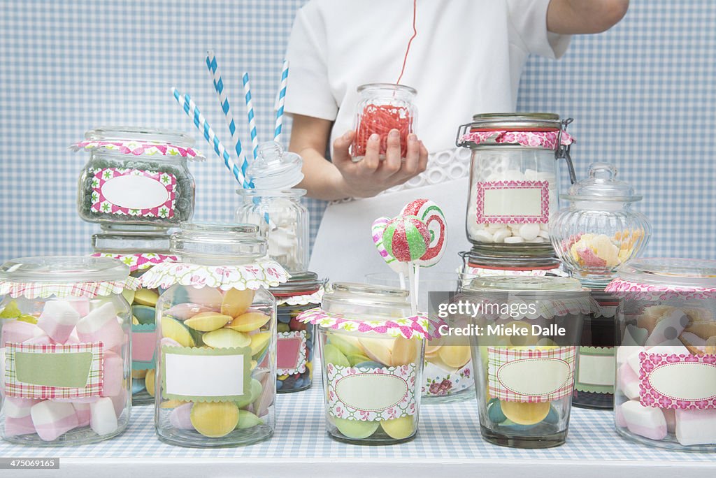Child playing in a candy store