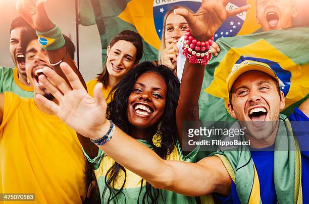 brazilian fan a stadium - coppa del mondo di calcio foto e immagini stock
