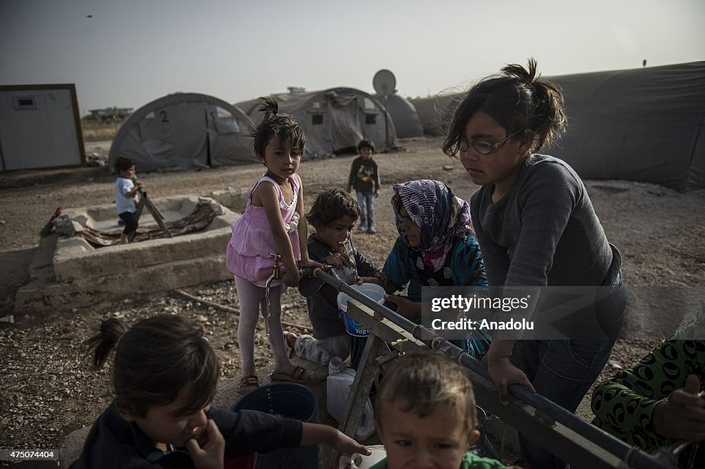 Syrian refugees living in tents in Sanliurfa's Suruc district