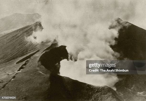 In this aerial image, volcanic ash spews from Mount Shindake at Kuchinoerabu Island on November 27, 1966 in Yakushima, Kagoshima, Japan.