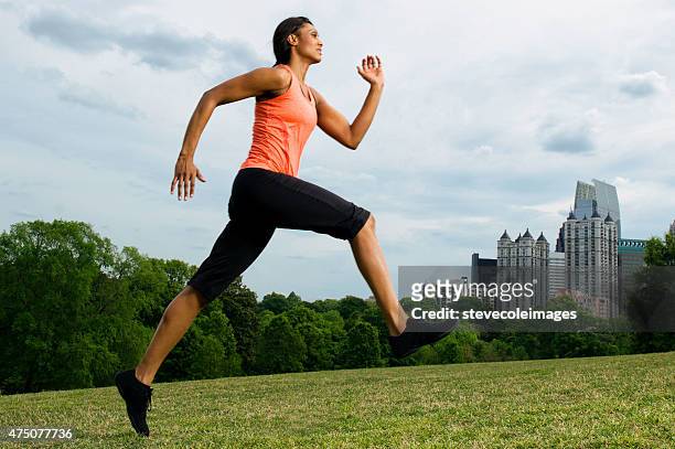 woman runner. - atlanta sunrise stock pictures, royalty-free photos & images