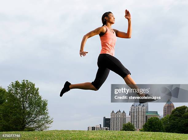 woman runner. - atlanta sunrise stock pictures, royalty-free photos & images