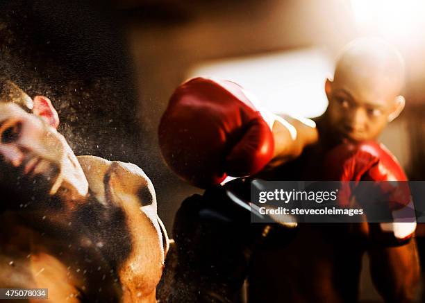 young woman boxer. - knockout punch stock pictures, royalty-free photos & images