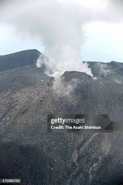 In this aerial image, volcanic ash spews from Mount Shindake at Kuchinoerabu Island on August 12, 2014 in Yakushima, Kagoshima, Japan.