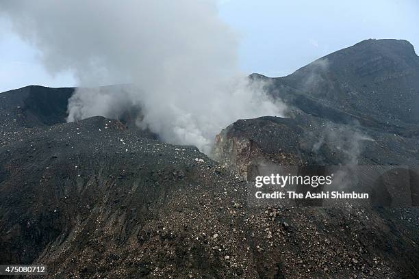 In this aerial image, volcanic ash spews from Mount Shindake at Kuchinoerabu Island on August 12, 2014 in Yakushima, Kagoshima, Japan.