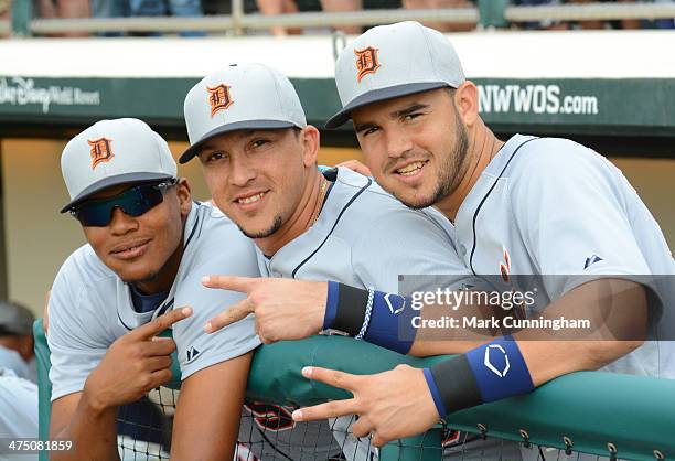 Francisco Martinez, Hernan Perez and Eugenio Suarez of the Detroit Tigers pose for a photo before the spring training game against the Atlanta Braves...