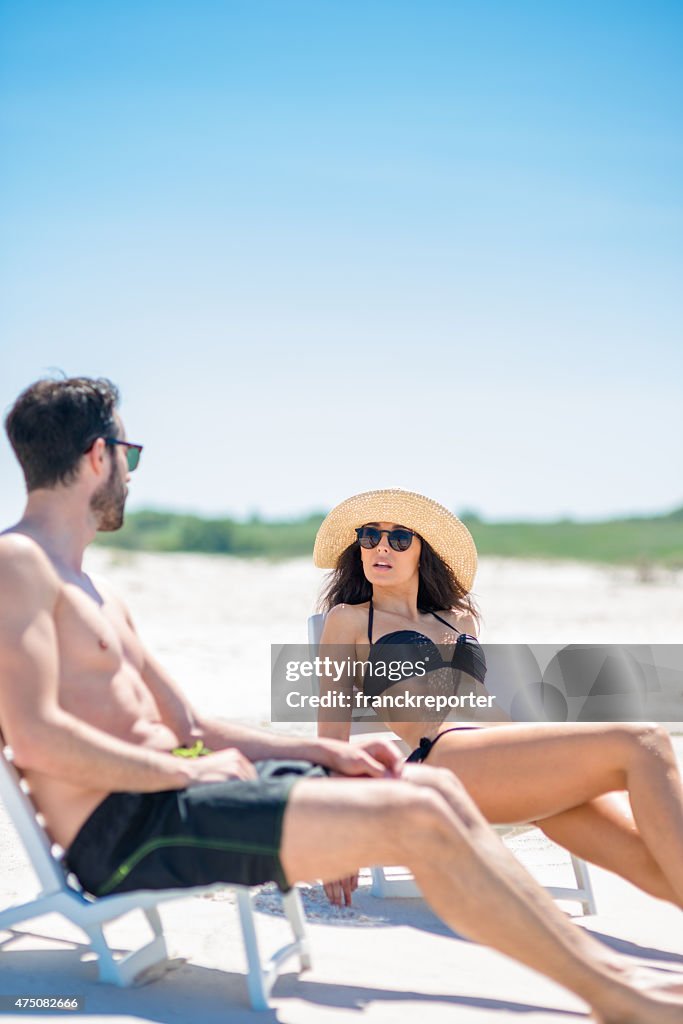 Happiness couple at the seaside relaxing