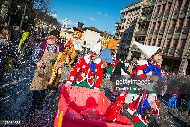 italian carnival celebration parade in small town - tiny pinocchio stock pictures, royalty-free photos & images