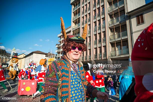 italian carnival celebration parade in small town - tiny pinocchio stock pictures, royalty-free photos & images