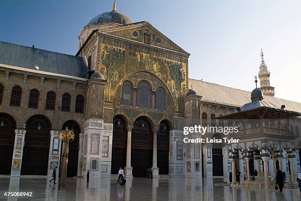 Golden mosaics on the facade of the prayer hall of the Umayyad Mosque in the Old Town of Damascus, Syria. Syria's main mosque was built in AD 705. A...