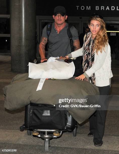 AnnaLynne McCord and Dominic Purcell seen at LAX airport on February 26, 2014 in Los Angeles, California.