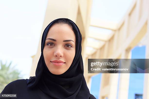 businesswoman in dubai - saudi arabia women stock pictures, royalty-free photos & images