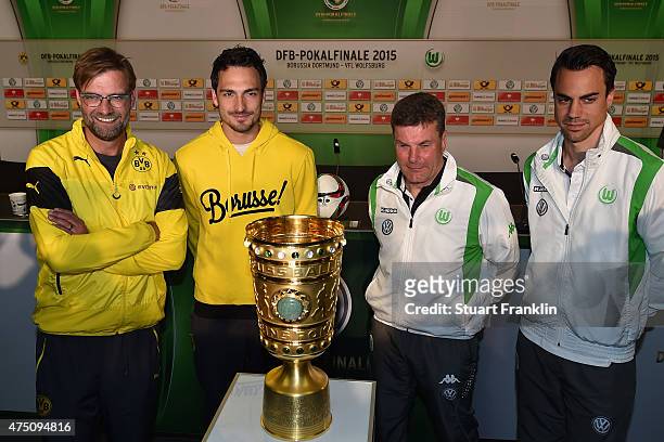 Head coach of Borussia Dortmund Juergen Klopp, team captain of Borussia Dortmund Mats Hummels, head coach of VfL Wolfsburg Dieter Hecking, Team...