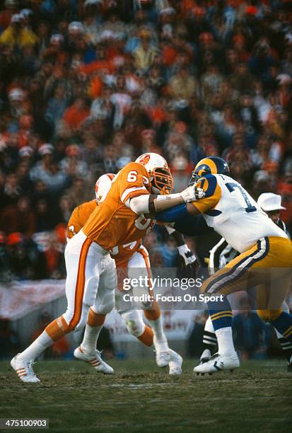 Lee Roy Selmon of the Tampa Bay Buccaneers in action against Doug France of the Los Angeles Rams during an NFL football game circa 1979 at Tampa...