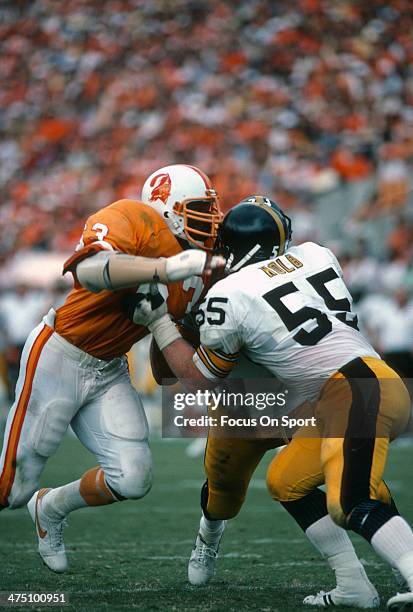 Lee Roy Selmon of the Tampa Bay Buccaneers in action against Jon Kolb of the Pittsburgh Steelers during an NFL football game November 9, 1980 at...