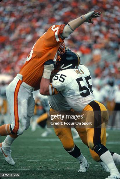 Lee Roy Selmon of the Tampa Bay Buccaneers in action against Jon Kolb of the Pittsburgh Steelers during an NFL football game November 9, 1980 at...