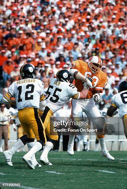 Lee Roy Selmon of the Tampa Bay Buccaneers in action against Jon Kolb of the Pittsburgh Steelers during an NFL football game November 9, 1980 at...