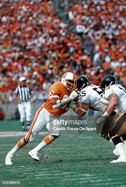 Lee Roy Selmon of the Tampa Bay Buccaneers in action against Jon Kolb of the Pittsburgh Steelers during an NFL football game November 9, 1980 at...