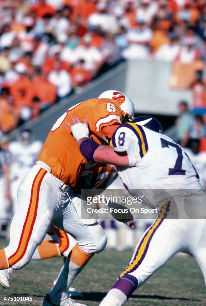 Lee Roy Selmon of the Tampa Bay Buccaneers in action against Steve Riley of the Minnesota Vikings during an NFL football game December 7, 1980 at...