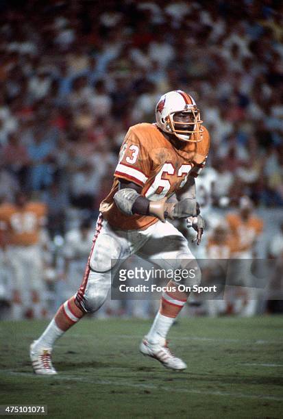 Lee Roy Selmon of the Tampa Bay Buccaneers in action during an NFL football game circa 1976 at Tampa Stadium in Tampa Bay, Florida. Selmon played for...