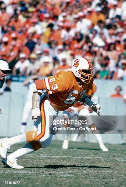 Lee Roy Selmon of the Tampa Bay Buccaneers in action during an NFL football game circa 1980 at Tampa Stadium in Tampa Bay, Florida. Selmon played for...