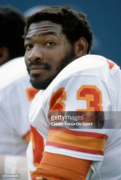 Lee Roy Selmon of the Tampa Bay Buccaneers looks on from the bench during an NFL football game circa 1980. Selmon played for the Buccaneers from...