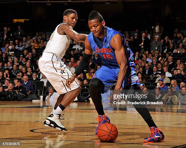 Will Yeguete of the Florida Gators plays against the Vanderbilt Commodores at Memorial Gym on February 25, 2014 in Nashville, Tennessee.