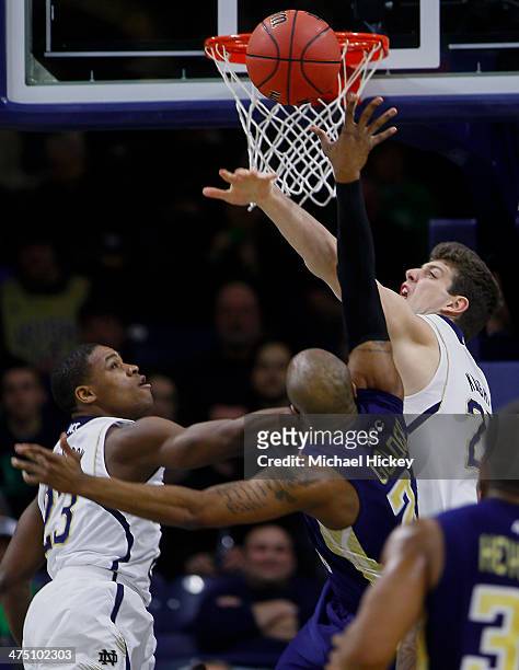 Tom Knight of the Notre Dame Fighting Irish bats away the shot of Trae Golden of the Georgia Tech Yellow Jackets at Purcel Pavilion on February 11,...
