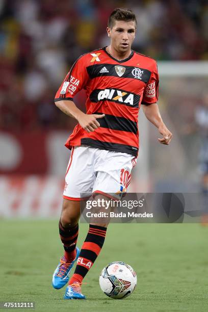 Lucas Mugni of Flamengo battles for the ball during a match between Flamengo and Emelec as part of Copa Bridgestone Libertadores 2014 at Maracana...