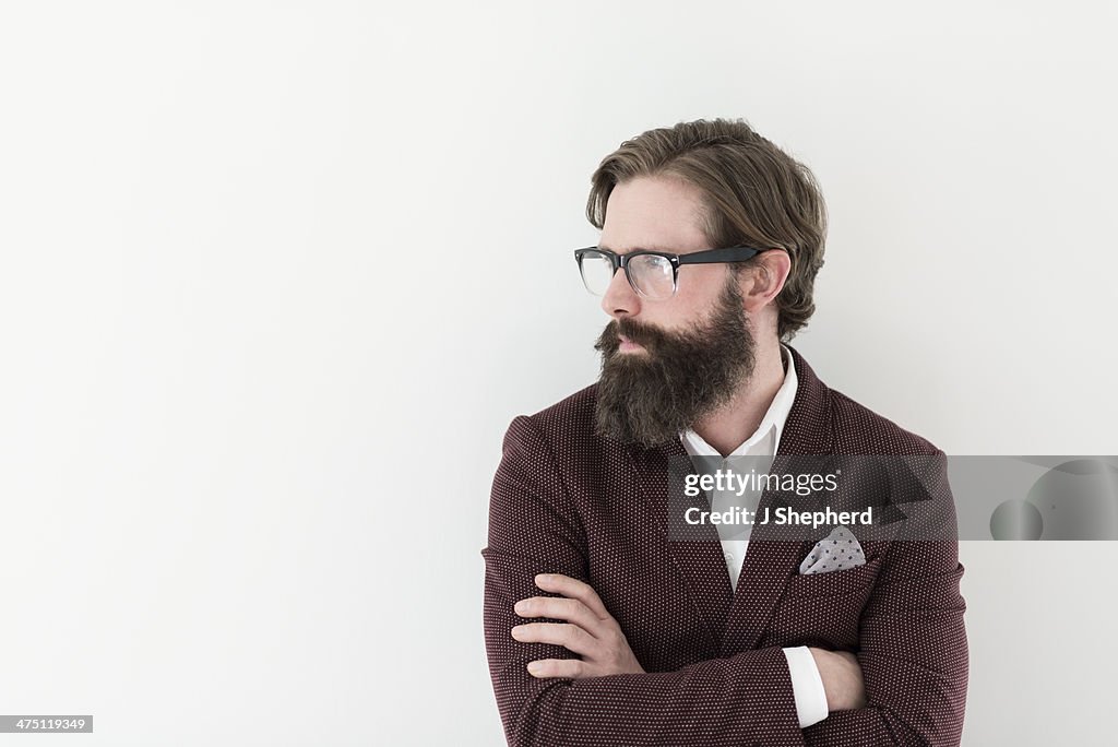 Bearded man looking to side