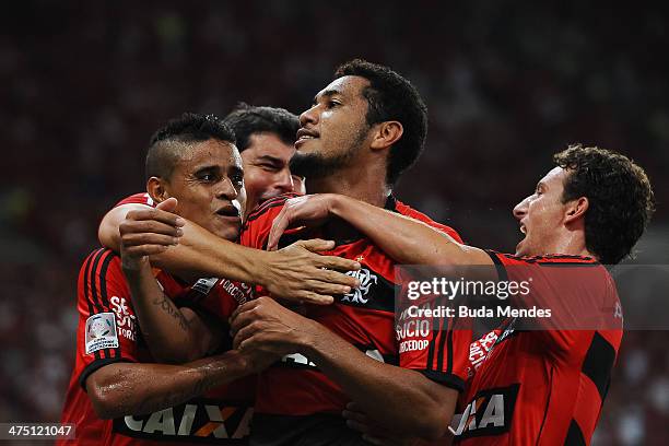 Everton, Elano and Hernane of Flamengo celebrate a scored against of Emelec during a match between Flamengo and Emelec as part of Copa Bridgestone...