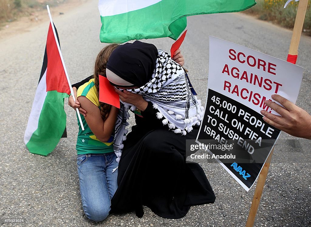 Palestinians protest demanding FIFA to suspend Israel from world football