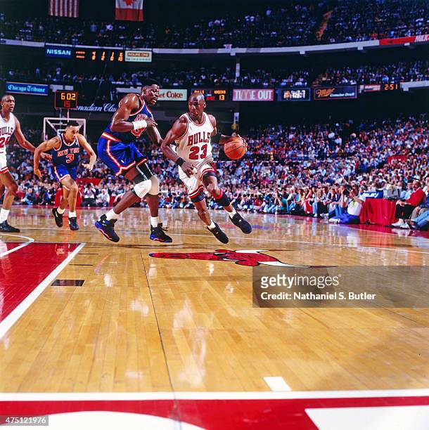 Michael Jordan of the Chicago Bulls dribbles against Patrick Ewing of the New York Knicks during Game Four of the 1993 Eastern Conference Finals on...