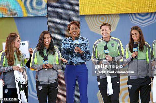 Robin Roberts with members of the U.S. Women's National Soccer Team on stage at ABC's 'Good Morning America' at Rumsey Playfield, Central Park on May...