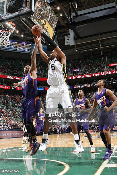 John Lucas III of the Utah Jazz shoots against the Phoenix Suns at EnergySolutions Arena on February 26, 2014 in Salt Lake City, Utah. NOTE TO USER:...